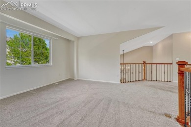 Nestled on a tree-lined street in the heart of District 20 and on Pine Creek Golf Club in Colorado - for sale on GolfHomes.com, golf home, golf lot