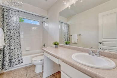 Nestled on a tree-lined street in the heart of District 20 and on Pine Creek Golf Club in Colorado - for sale on GolfHomes.com, golf home, golf lot