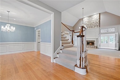 Nestled on a Charming Wooded Cul-de-sac, this Stunning 1.5-story on Shadow Glen Golf Club in Kansas - for sale on GolfHomes.com, golf home, golf lot