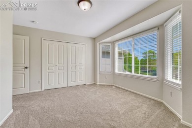 Nestled on a tree-lined street in the heart of District 20 and on Pine Creek Golf Club in Colorado - for sale on GolfHomes.com, golf home, golf lot