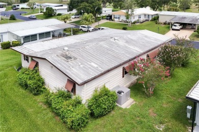Well-maintained 2-bedroom, 2-bath manufactured home located in on Zellwood Station Country Club in Florida - for sale on GolfHomes.com, golf home, golf lot