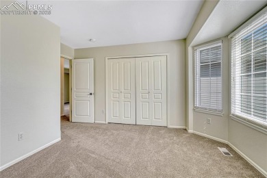 Nestled on a tree-lined street in the heart of District 20 and on Pine Creek Golf Club in Colorado - for sale on GolfHomes.com, golf home, golf lot