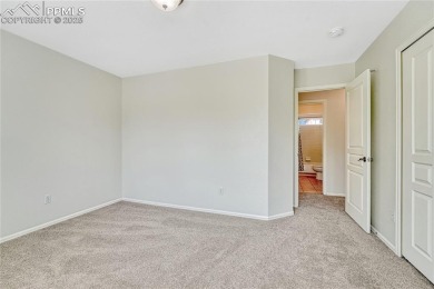 Nestled on a tree-lined street in the heart of District 20 and on Pine Creek Golf Club in Colorado - for sale on GolfHomes.com, golf home, golf lot