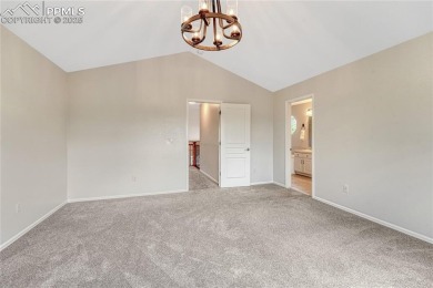 Nestled on a tree-lined street in the heart of District 20 and on Pine Creek Golf Club in Colorado - for sale on GolfHomes.com, golf home, golf lot