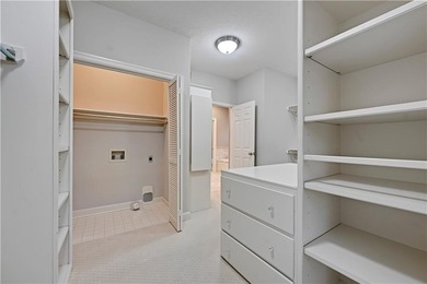 Nestled on a Charming Wooded Cul-de-sac, this Stunning 1.5-story on Shadow Glen Golf Club in Kansas - for sale on GolfHomes.com, golf home, golf lot