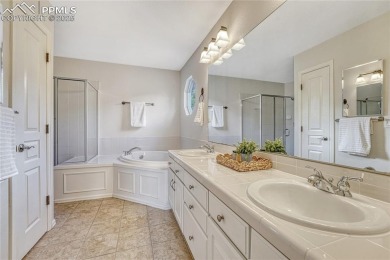 Nestled on a tree-lined street in the heart of District 20 and on Pine Creek Golf Club in Colorado - for sale on GolfHomes.com, golf home, golf lot