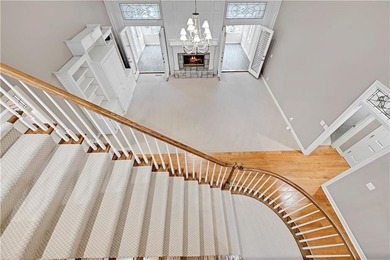 Nestled on a Charming Wooded Cul-de-sac, this Stunning 1.5-story on Shadow Glen Golf Club in Kansas - for sale on GolfHomes.com, golf home, golf lot