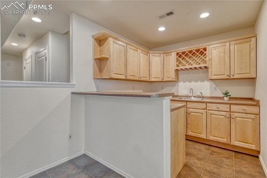 Nestled on a tree-lined street in the heart of District 20 and on Pine Creek Golf Club in Colorado - for sale on GolfHomes.com, golf home, golf lot