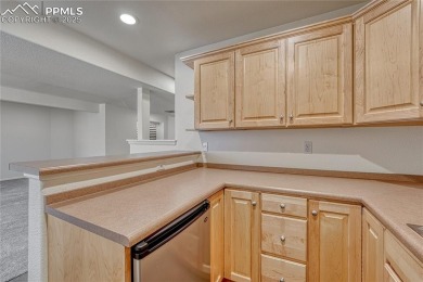 Nestled on a tree-lined street in the heart of District 20 and on Pine Creek Golf Club in Colorado - for sale on GolfHomes.com, golf home, golf lot
