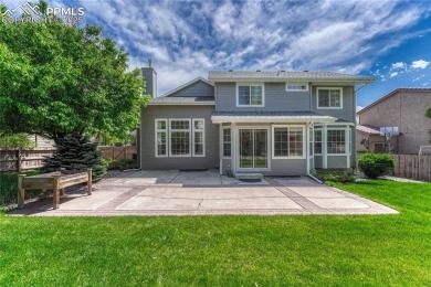 Nestled on a tree-lined street in the heart of District 20 and on Pine Creek Golf Club in Colorado - for sale on GolfHomes.com, golf home, golf lot