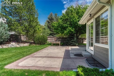 Nestled on a tree-lined street in the heart of District 20 and on Pine Creek Golf Club in Colorado - for sale on GolfHomes.com, golf home, golf lot