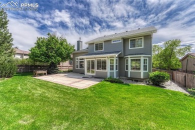 Nestled on a tree-lined street in the heart of District 20 and on Pine Creek Golf Club in Colorado - for sale on GolfHomes.com, golf home, golf lot