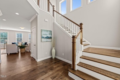 Welcome to 1046 Covered Bridge Trail - a spacious and elegant on The Preserve At Jordan Lake Golf Club in North Carolina - for sale on GolfHomes.com, golf home, golf lot