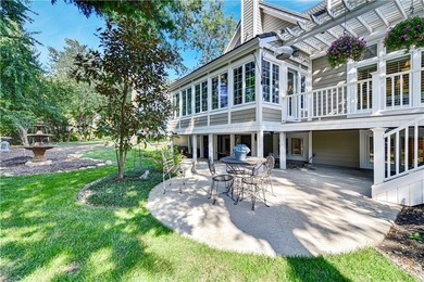 Nestled on a Charming Wooded Cul-de-sac, this Stunning 1.5-story on Shadow Glen Golf Club in Kansas - for sale on GolfHomes.com, golf home, golf lot