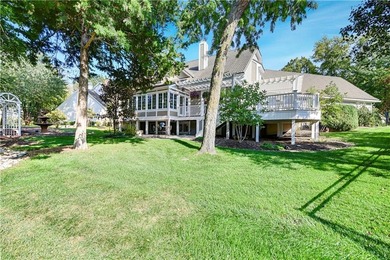 Nestled on a Charming Wooded Cul-de-sac, this Stunning 1.5-story on Shadow Glen Golf Club in Kansas - for sale on GolfHomes.com, golf home, golf lot