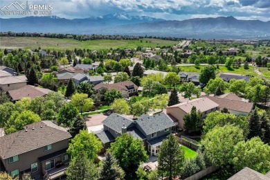 Nestled on a tree-lined street in the heart of District 20 and on Pine Creek Golf Club in Colorado - for sale on GolfHomes.com, golf home, golf lot