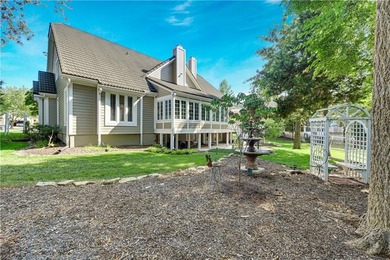 Nestled on a Charming Wooded Cul-de-sac, this Stunning 1.5-story on Shadow Glen Golf Club in Kansas - for sale on GolfHomes.com, golf home, golf lot