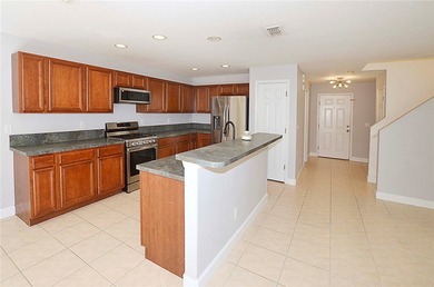 Discover relaxed living in the four bedroom, three bathroom on The Club At Pointe West in Florida - for sale on GolfHomes.com, golf home, golf lot