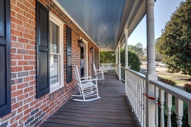 Welcome to this stunning executive-style, all-brick residence on The Golf Club At Rocky Mount in North Carolina - for sale on GolfHomes.com, golf home, golf lot