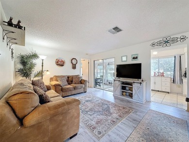 GROUND FLOOR CONDO located on the 8th Fairway of the Heather on Heather Golf and Country Club in Florida - for sale on GolfHomes.com, golf home, golf lot