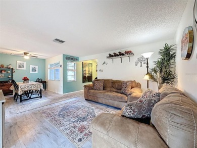 GROUND FLOOR CONDO located on the 8th Fairway of the Heather on Heather Golf and Country Club in Florida - for sale on GolfHomes.com, golf home, golf lot