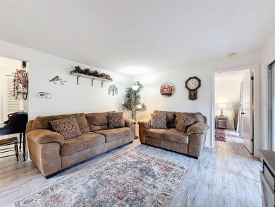 GROUND FLOOR CONDO located on the 8th Fairway of the Heather on Heather Golf and Country Club in Florida - for sale on GolfHomes.com, golf home, golf lot