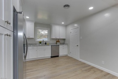 Absolutely GORGEOUS remodeled Portsmouth home w/ an open floor on Elizabeth Manor Golf and Country Club in Virginia - for sale on GolfHomes.com, golf home, golf lot