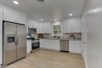 Absolutely GORGEOUS remodeled Portsmouth home w/ an open floor on Elizabeth Manor Golf and Country Club in Virginia - for sale on GolfHomes.com, golf home, golf lot