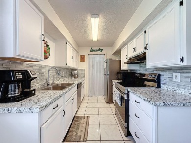 GROUND FLOOR CONDO located on the 8th Fairway of the Heather on Heather Golf and Country Club in Florida - for sale on GolfHomes.com, golf home, golf lot