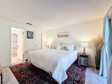 GROUND FLOOR CONDO located on the 8th Fairway of the Heather on Heather Golf and Country Club in Florida - for sale on GolfHomes.com, golf home, golf lot