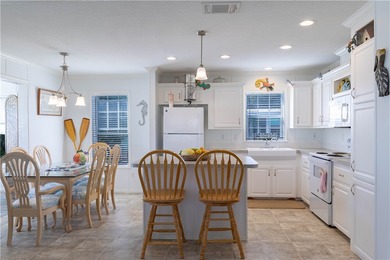 Built in 2021, this beautiful and spacious 2-bedroom, 2-bath on Barefoot Bay Golf Course in Florida - for sale on GolfHomes.com, golf home, golf lot