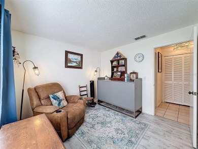 GROUND FLOOR CONDO located on the 8th Fairway of the Heather on Heather Golf and Country Club in Florida - for sale on GolfHomes.com, golf home, golf lot