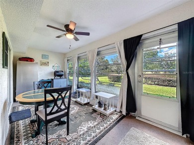 GROUND FLOOR CONDO located on the 8th Fairway of the Heather on Heather Golf and Country Club in Florida - for sale on GolfHomes.com, golf home, golf lot