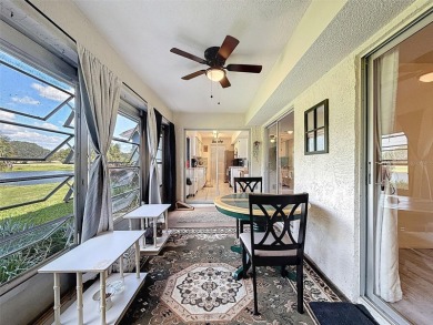 GROUND FLOOR CONDO located on the 8th Fairway of the Heather on Heather Golf and Country Club in Florida - for sale on GolfHomes.com, golf home, golf lot