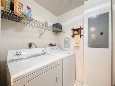 GROUND FLOOR CONDO located on the 8th Fairway of the Heather on Heather Golf and Country Club in Florida - for sale on GolfHomes.com, golf home, golf lot