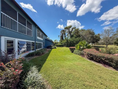 GROUND FLOOR CONDO located on the 8th Fairway of the Heather on Heather Golf and Country Club in Florida - for sale on GolfHomes.com, golf home, golf lot