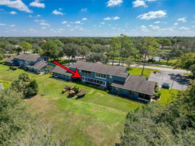 GROUND FLOOR CONDO located on the 8th Fairway of the Heather on Heather Golf and Country Club in Florida - for sale on GolfHomes.com, golf home, golf lot