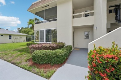 This one is a gem! With stylish finishes, wood flooring, cozy on Palm Aire Country Club of Sarasota in Florida - for sale on GolfHomes.com, golf home, golf lot