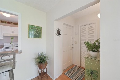 This one is a gem! With stylish finishes, wood flooring, cozy on Palm Aire Country Club of Sarasota in Florida - for sale on GolfHomes.com, golf home, golf lot