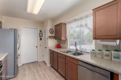 This lovely Sun City home is light & bright with an open concept on PalmBrook Country Club in Arizona - for sale on GolfHomes.com, golf home, golf lot
