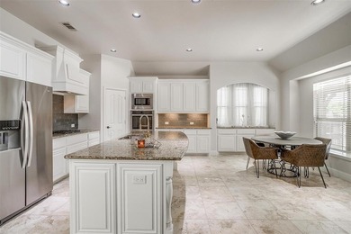 Gorgeous home with a stone & brick exterior and beautiful curb on Mansfield National Golf Club in Texas - for sale on GolfHomes.com, golf home, golf lot