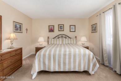 This lovely Sun City home is light & bright with an open concept on PalmBrook Country Club in Arizona - for sale on GolfHomes.com, golf home, golf lot