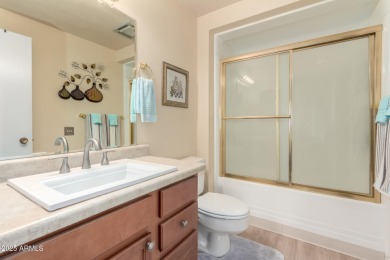 This lovely Sun City home is light & bright with an open concept on PalmBrook Country Club in Arizona - for sale on GolfHomes.com, golf home, golf lot
