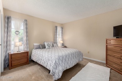 This lovely Sun City home is light & bright with an open concept on PalmBrook Country Club in Arizona - for sale on GolfHomes.com, golf home, golf lot