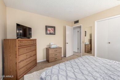 This lovely Sun City home is light & bright with an open concept on PalmBrook Country Club in Arizona - for sale on GolfHomes.com, golf home, golf lot