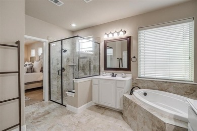 Gorgeous home with a stone & brick exterior and beautiful curb on Mansfield National Golf Club in Texas - for sale on GolfHomes.com, golf home, golf lot