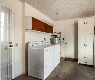 This lovely Sun City home is light & bright with an open concept on PalmBrook Country Club in Arizona - for sale on GolfHomes.com, golf home, golf lot