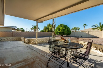 This lovely Sun City home is light & bright with an open concept on PalmBrook Country Club in Arizona - for sale on GolfHomes.com, golf home, golf lot