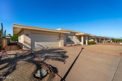 This lovely Sun City home is light & bright with an open concept on PalmBrook Country Club in Arizona - for sale on GolfHomes.com, golf home, golf lot