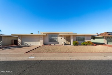 This lovely Sun City home is light & bright with an open concept on PalmBrook Country Club in Arizona - for sale on GolfHomes.com, golf home, golf lot